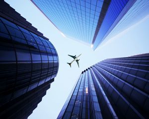 Preview wallpaper buildings, sky, plane, skyscrapers, architecture