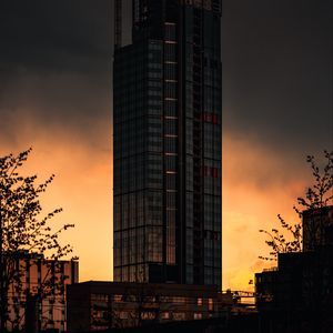 Preview wallpaper buildings, skyscraper, sunset, dark