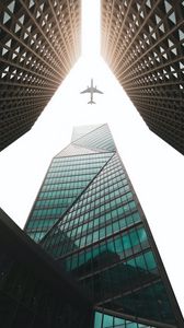 Preview wallpaper buildings, skyscrapers, airplane, sky