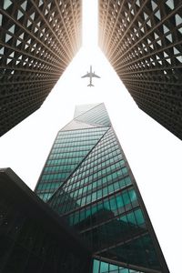 Preview wallpaper buildings, skyscrapers, airplane, sky