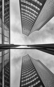 Preview wallpaper buildings, skyscrapers, bottom view, black and white, reflection