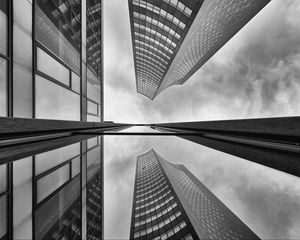 Preview wallpaper buildings, skyscrapers, bottom view, black and white, reflection