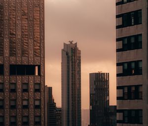 Preview wallpaper buildings, skyscrapers, city, architecture, sunset