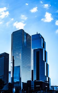 Preview wallpaper buildings, skyscrapers, city, sky, reflection