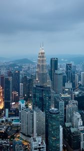 Preview wallpaper buildings, skyscrapers, city, evening, kuala lumpur, malaysia