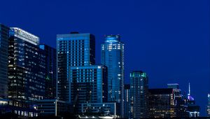 Preview wallpaper buildings, skyscrapers, lights, city, night, blue