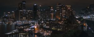 Preview wallpaper buildings, skyscrapers, lights, river, night