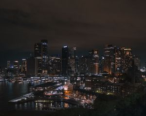 Preview wallpaper buildings, skyscrapers, lights, river, night