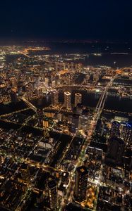 Preview wallpaper buildings, skyscrapers, lights, aerial view, height, city, night