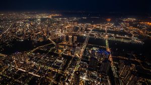 Preview wallpaper buildings, skyscrapers, lights, aerial view, height, city, night