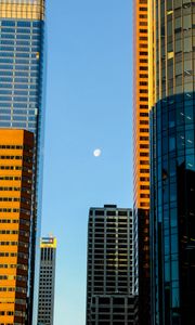 Preview wallpaper buildings, skyscrapers, moon, city, architecture