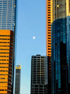 Preview wallpaper buildings, skyscrapers, moon, city, architecture