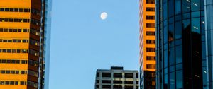 Preview wallpaper buildings, skyscrapers, moon, city, architecture