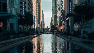Preview wallpaper buildings, skyscrapers, reflection, street, city