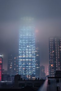 Preview wallpaper buildings, smog, fog, skyscrapers, night city