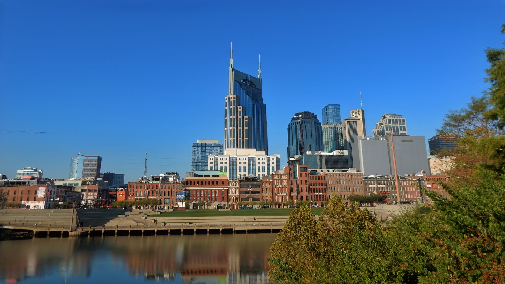 1920x1080 Wallpaper buildings, spires, reflection, river