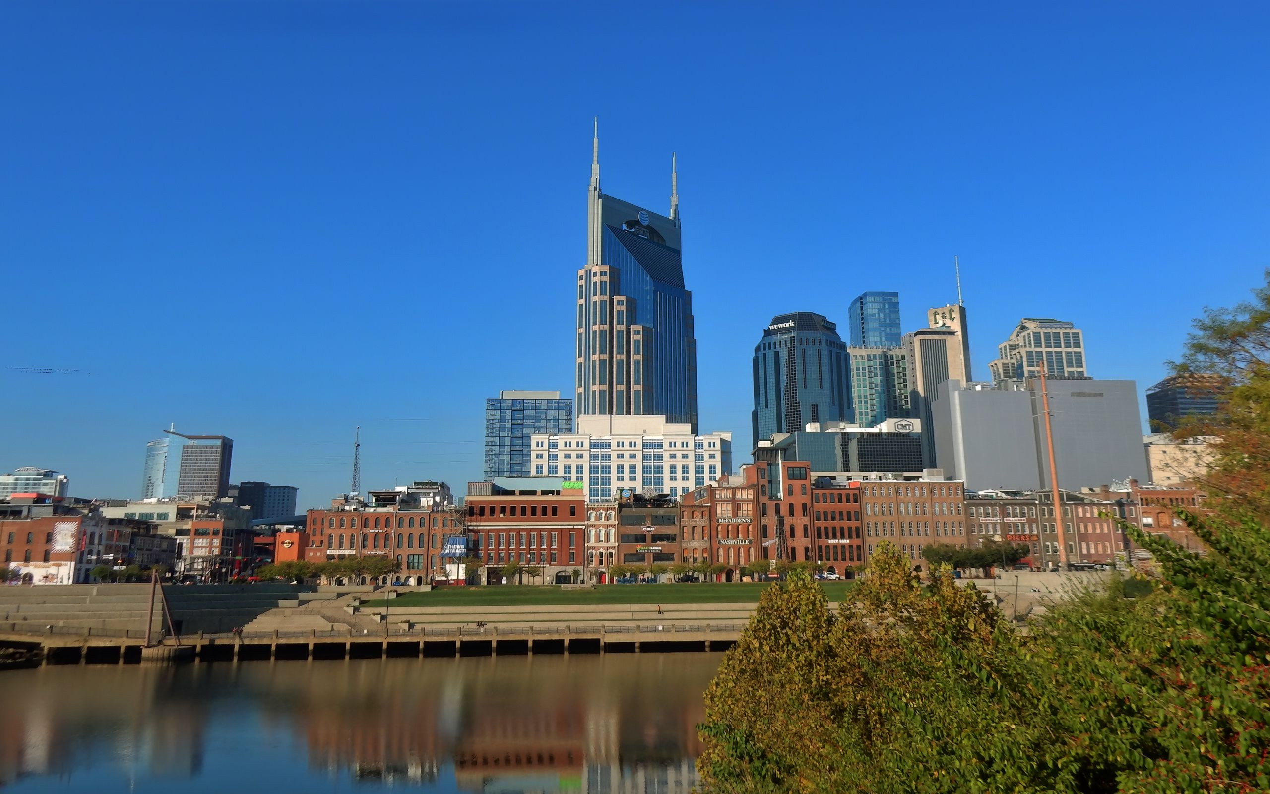 2560x1600 Wallpaper buildings, spires, reflection, river