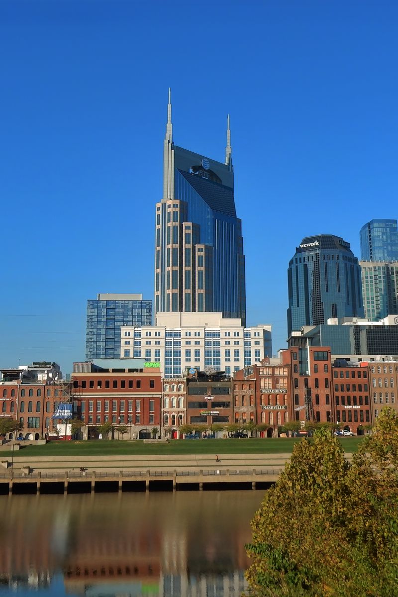 800x1200 Wallpaper buildings, spires, reflection, river
