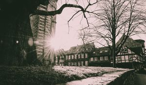 Preview wallpaper buildings, sun, light, city, bw