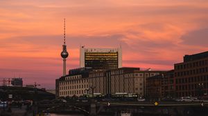 Preview wallpaper buildings, tower, bridge, city, sunset