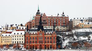 Preview wallpaper buildings, tower, city, snow, winter