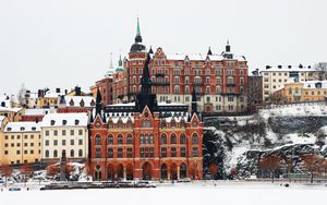 Preview wallpaper buildings, tower, city, snow, winter
