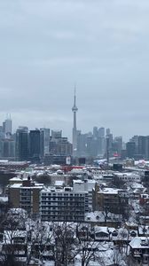 Preview wallpaper buildings, tower, snow, trees, winter, city