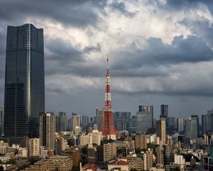 Preview wallpaper buildings, tower, spire, architecture, houses, city