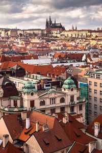 Preview wallpaper buildings, towers, architecture, roofs, tiles, city