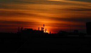 Preview wallpaper buildings, towers, silhouettes, sunset, sky, dark