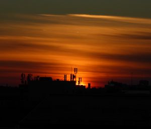 Preview wallpaper buildings, towers, silhouettes, sunset, sky, dark