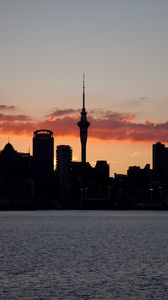 Preview wallpaper buildings, towers, silhouettes, sea, city, twilight