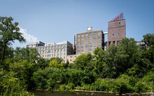 Preview wallpaper buildings, trees, river, bushes