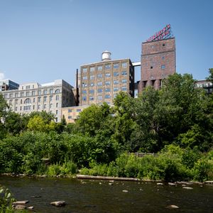 Preview wallpaper buildings, trees, river, bushes