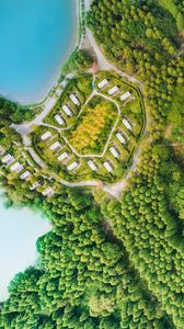 Preview wallpaper buildings, trees, road, aerial view, forest