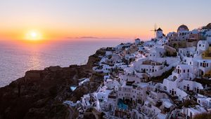 Preview wallpaper buildings, windmill, island, greece, sunset