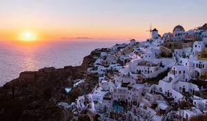 Preview wallpaper buildings, windmill, island, greece, sunset