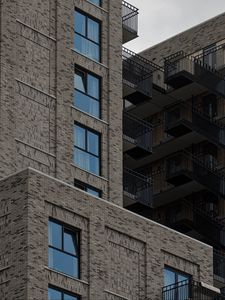 Preview wallpaper buildings, windows, balconies, facade, bricks