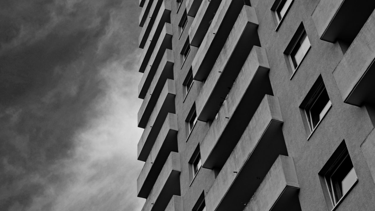 Wallpaper buildings, windows, facade, balconies, architecture, clouds, black and white