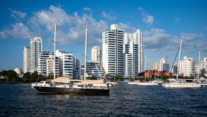 Preview wallpaper buildings, yachts, masts, sea, sky