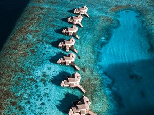 Preview wallpaper bungalow, ocean, water, aerial view