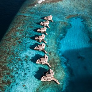 Preview wallpaper bungalow, ocean, water, aerial view