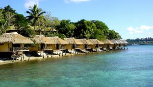 Preview wallpaper bungalow, row, coast, resort, rest, palm trees