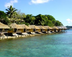 Preview wallpaper bungalow, row, coast, resort, rest, palm trees