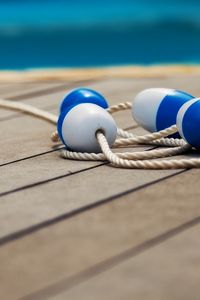 Preview wallpaper buoys, macro, boards, rope