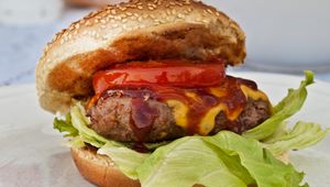 Preview wallpaper burger, cheddar, cheese, bun, patty, sesame seeds, lettuce, sauce
