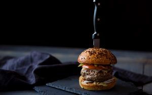 Premium Photo | Massive tasty burger wallpaper fast food ai generative