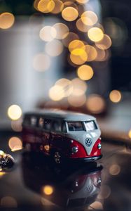 Preview wallpaper bus, toy, bokeh, glare