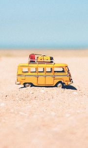 Preview wallpaper bus, toy, sand, beach, yellow