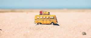 Preview wallpaper bus, toy, sand, beach, yellow